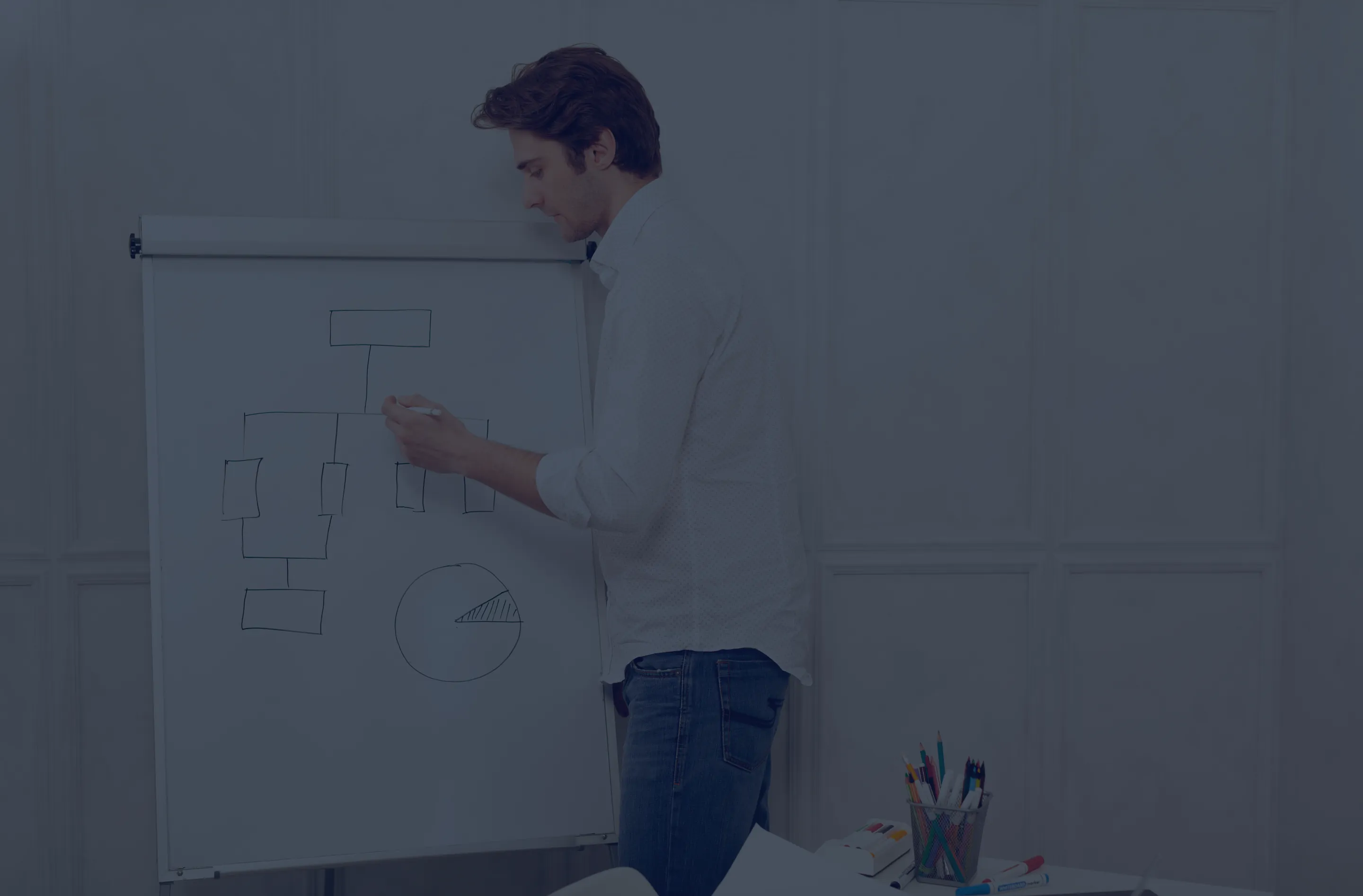 Engineer drawing the streaming architecture on a whiteboard