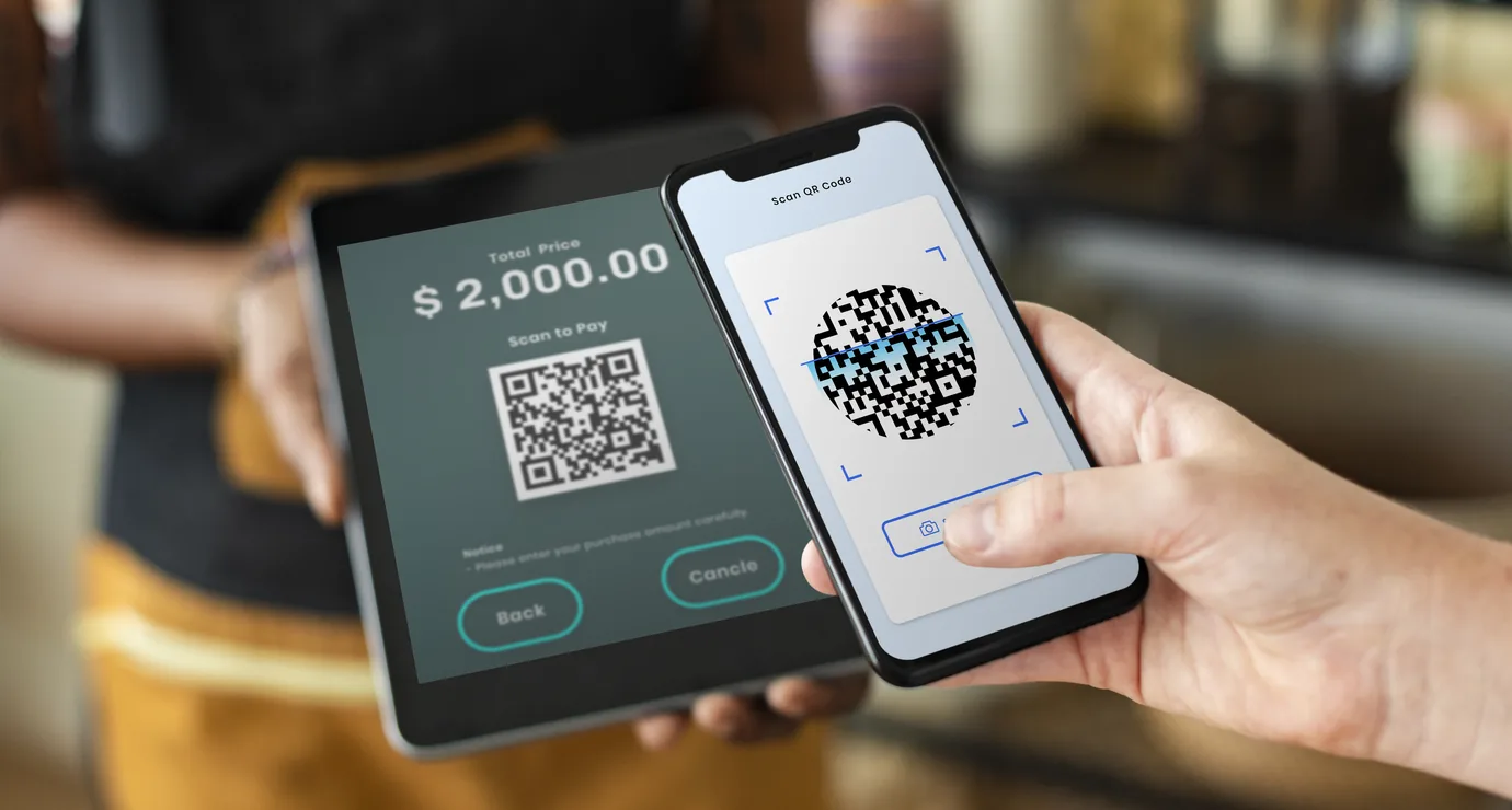 QR code payment being made at a counter