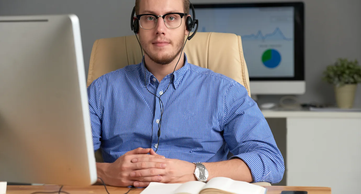 Presenter delivering a webinar wearing a headset