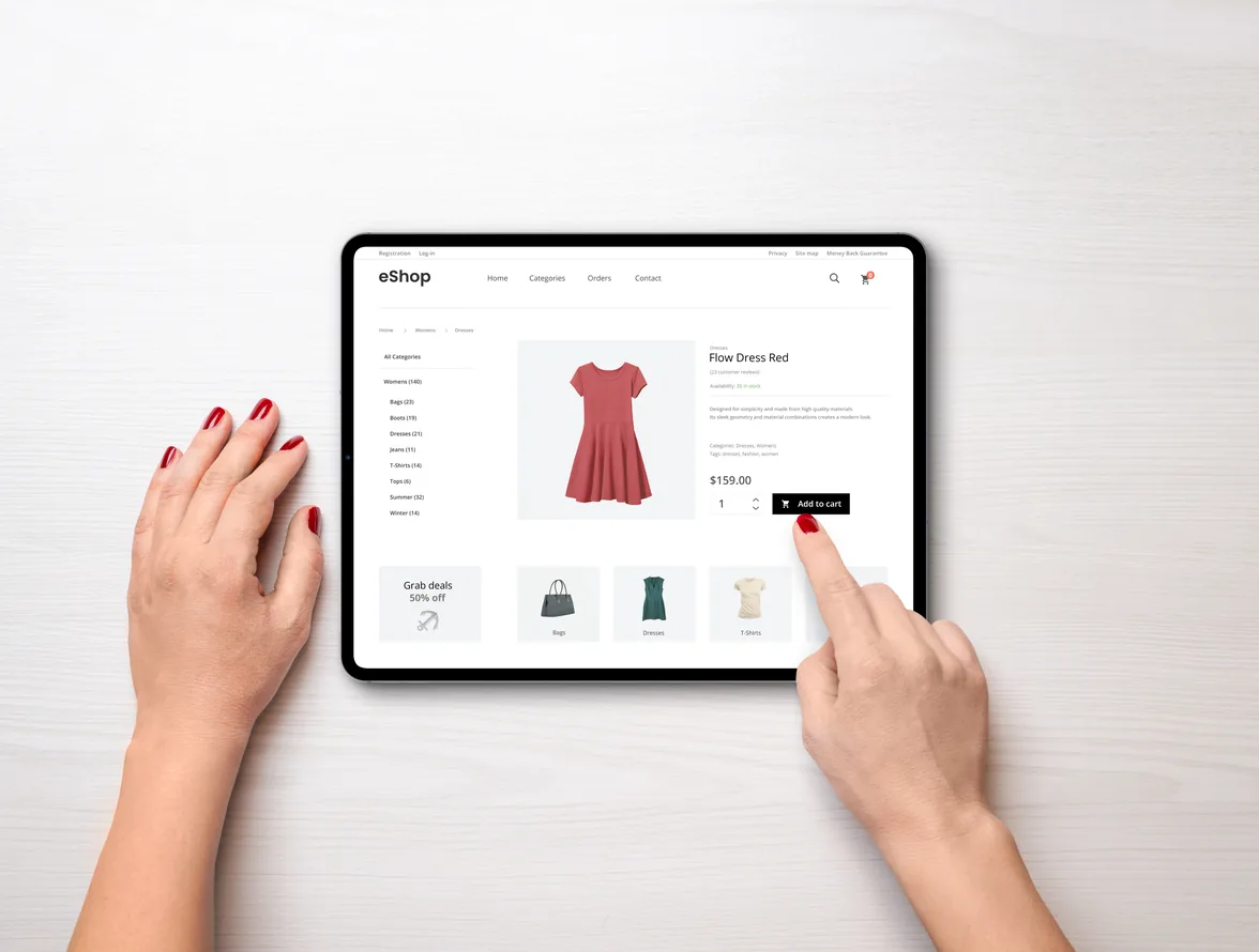 Fashion brand ecommerce storefront on a laptop and phone