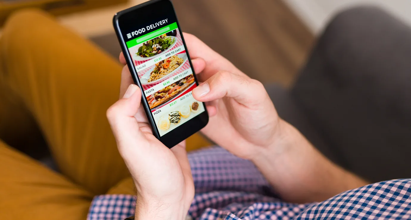 Customer placing a food order on a branded mobile app